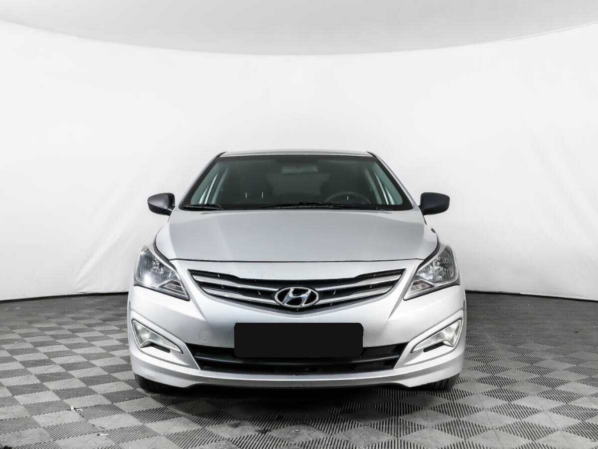 Hyundai Solaris с пробегом — 2014 год. Фото: #1