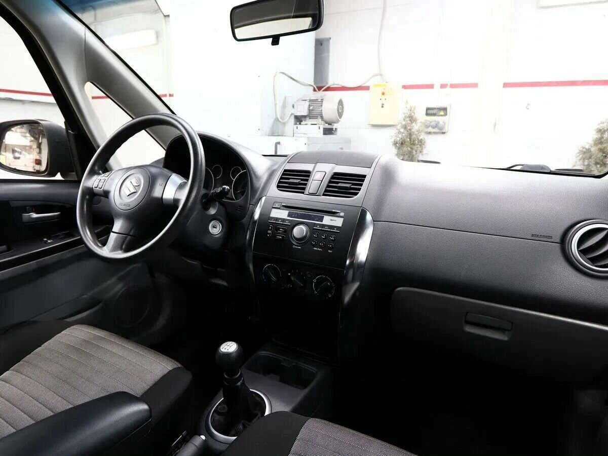Suzuki SX4 с пробегом — 2013 год. Фото: #8