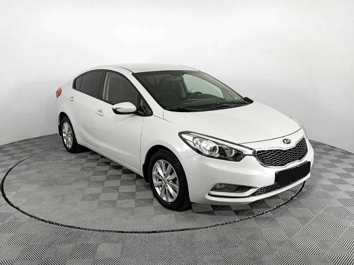 Kia Cerato с пробегом — 2014 год. Фото: #2