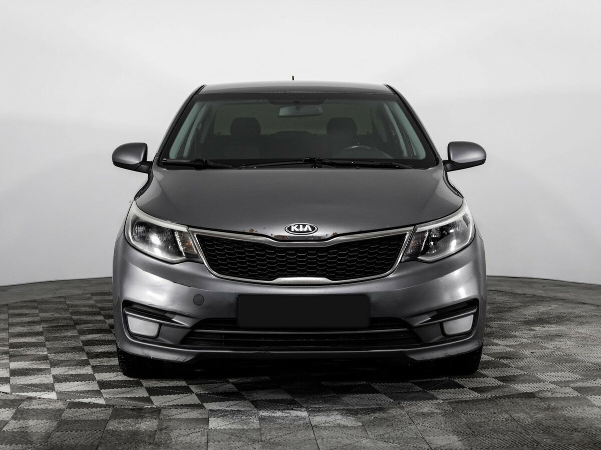 Kia Rio с пробегом — 2015 год. Фото: #1