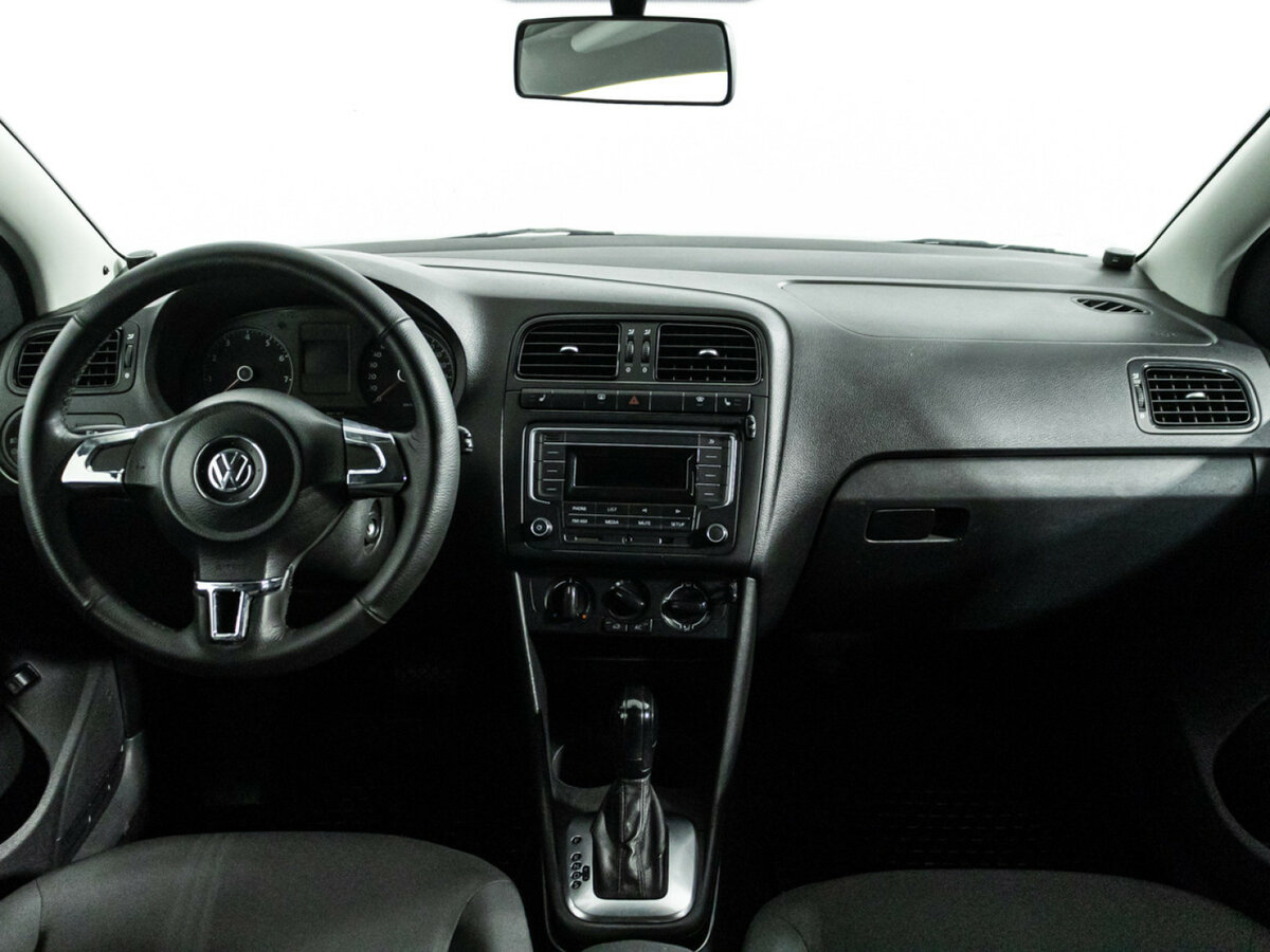 Volkswagen Polo с пробегом — 2013 год. Фото: #12