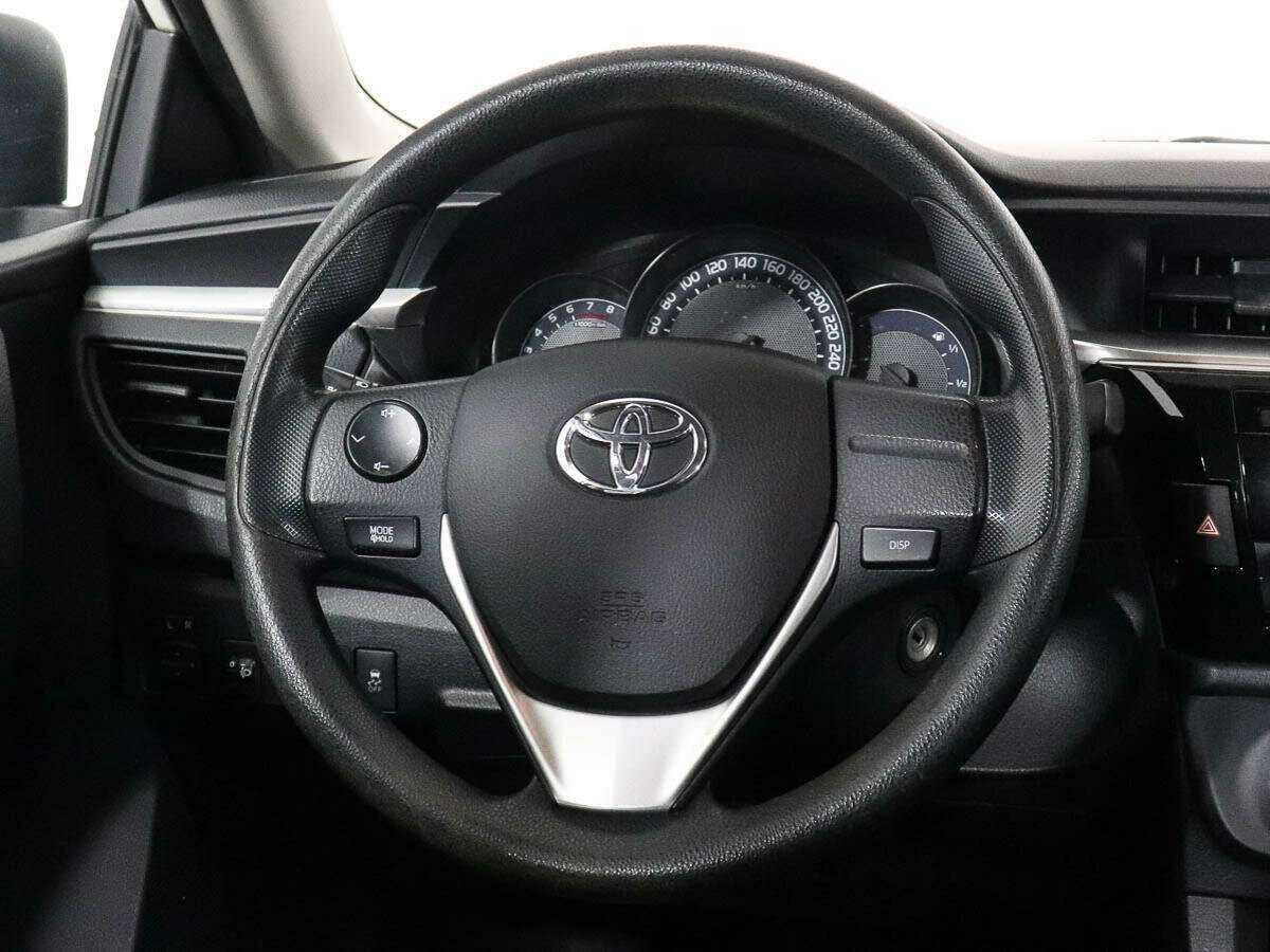 Toyota Corolla с пробегом — 2013 год. Фото: #10
