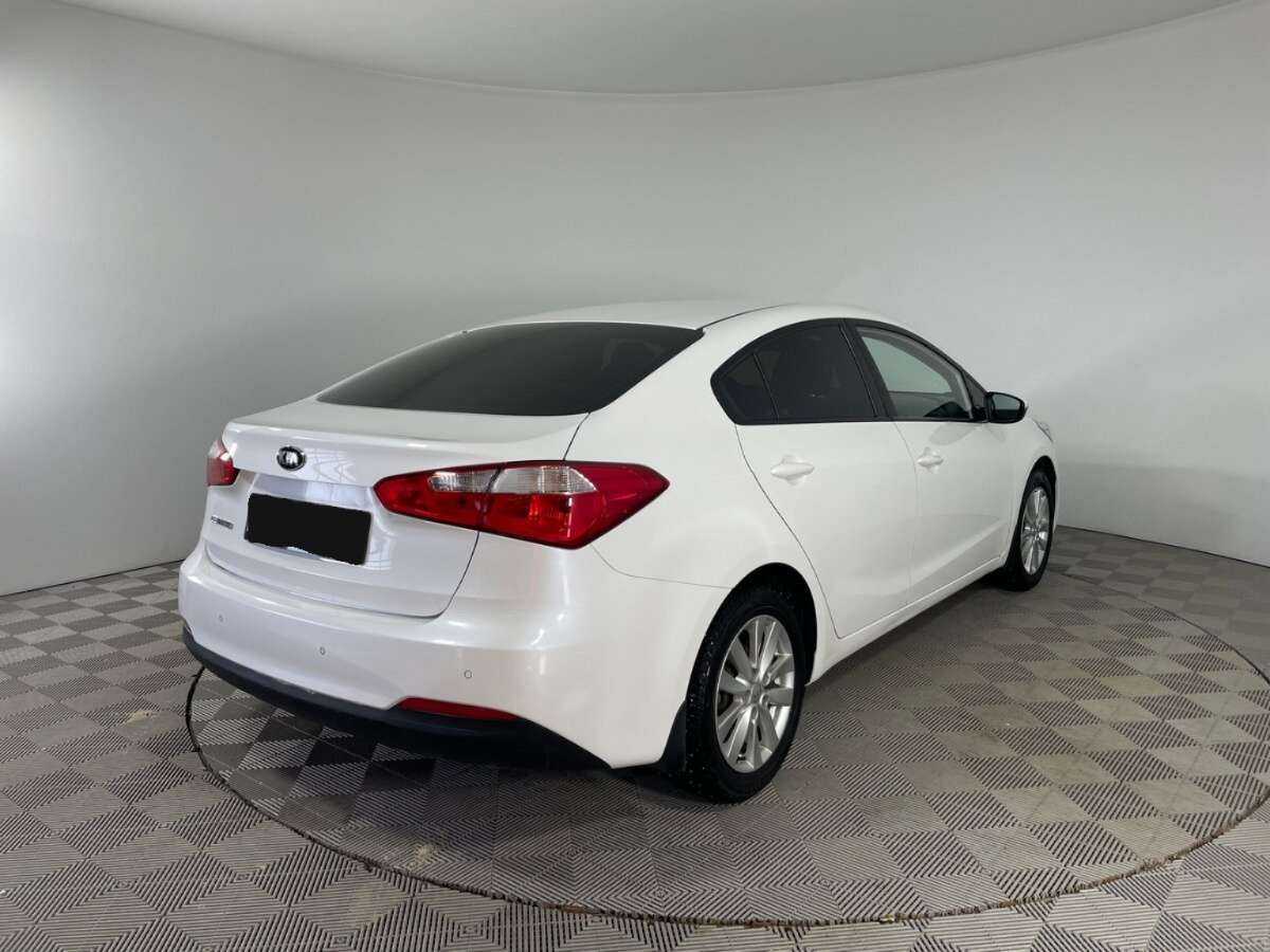 Kia Cerato с пробегом — 2014 год. Фото: #3