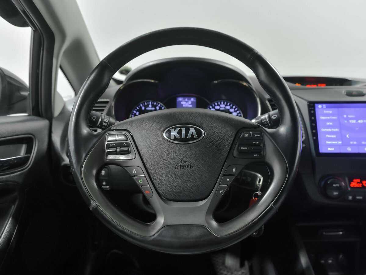 Kia Cerato с пробегом — 2014 год. Фото: #6
