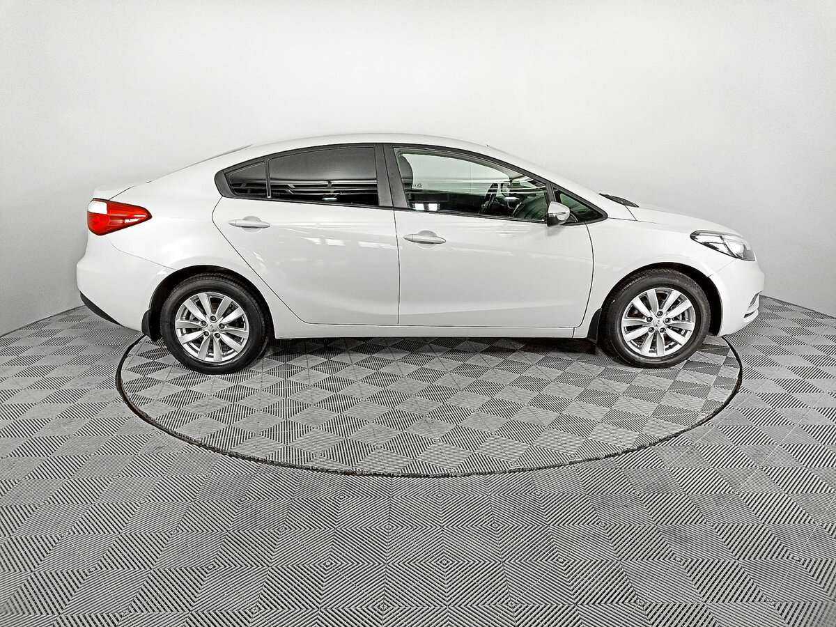Kia Cerato с пробегом — 2014 год. Фото: #3
