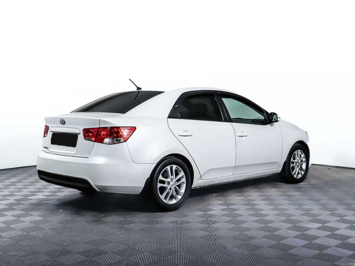 Kia Cerato с пробегом — 2012 год. Фото: #4
