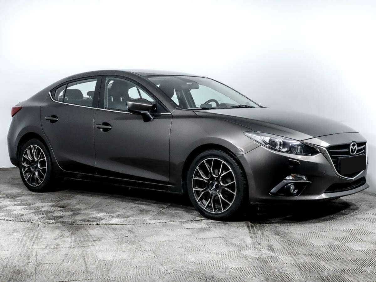 Mazda 3 с пробегом — 2014 год. Фото: #2