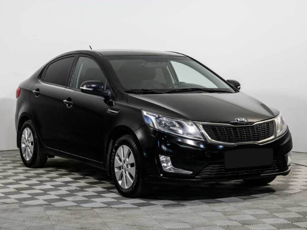 Kia Rio с пробегом — 2014 год. Фото: #1