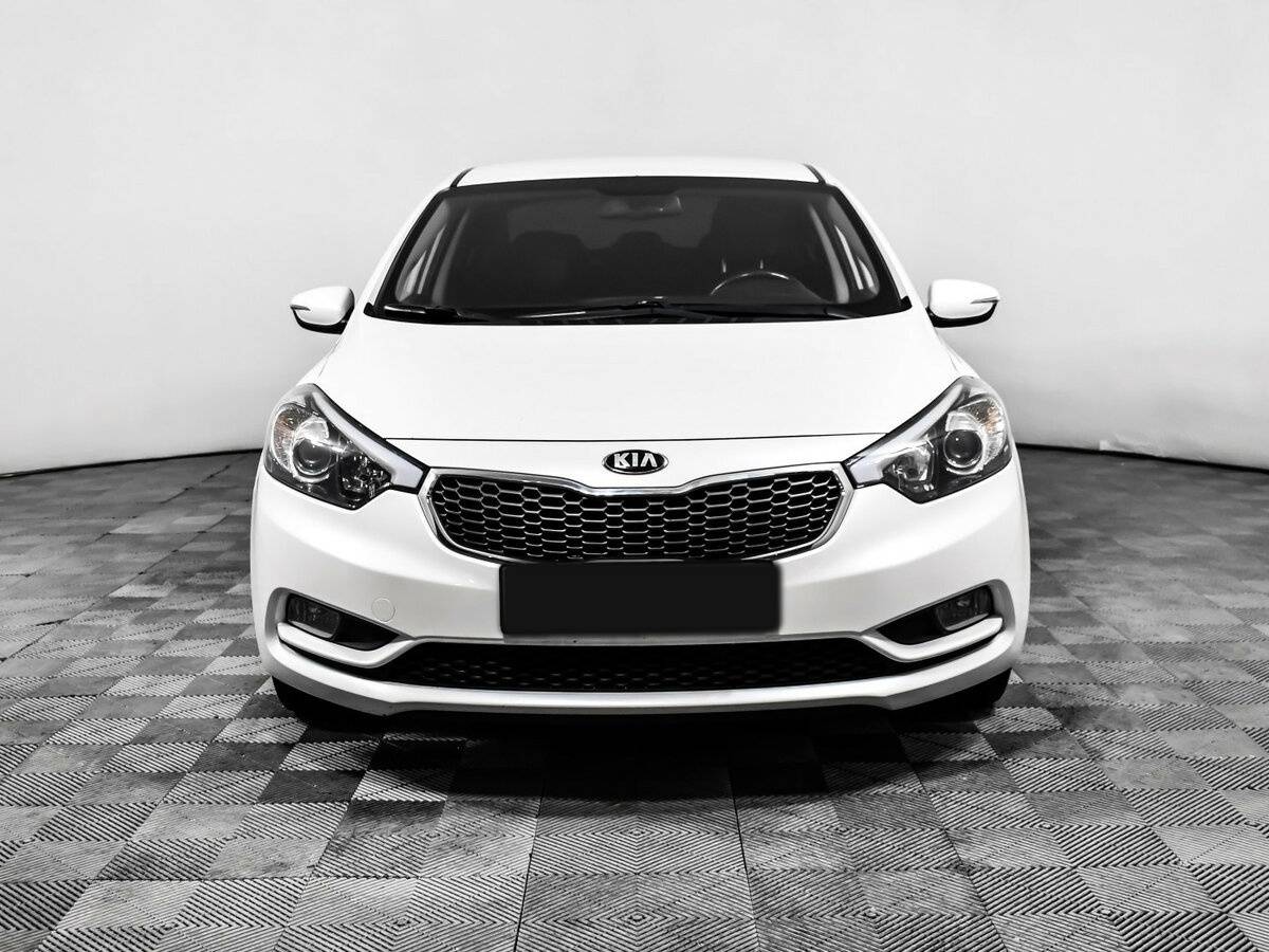 Kia Cerato с пробегом — 2013 год. Фото: #1