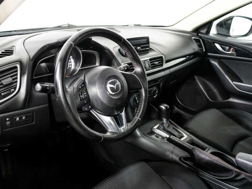 Mazda 3 с пробегом — 2014 год. Фото: #9
