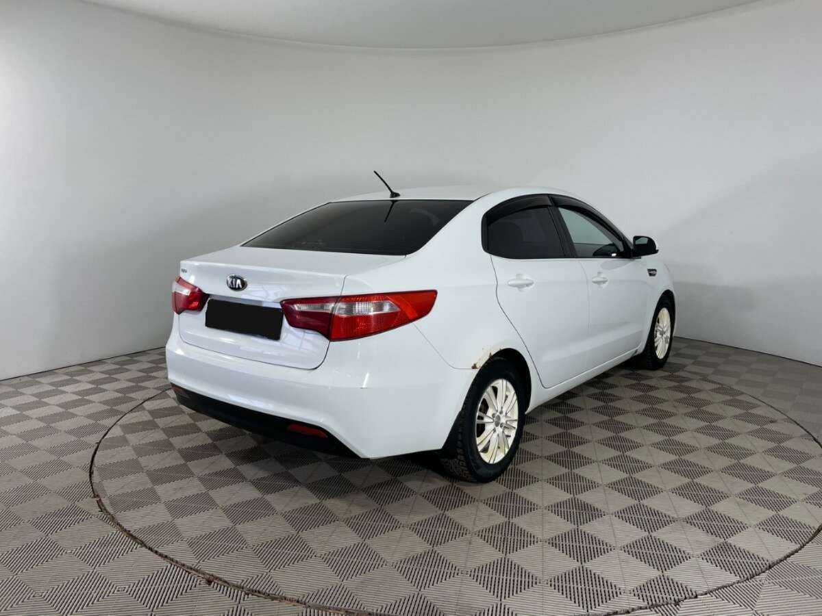Kia Rio с пробегом — 2013 год. Фото: #3