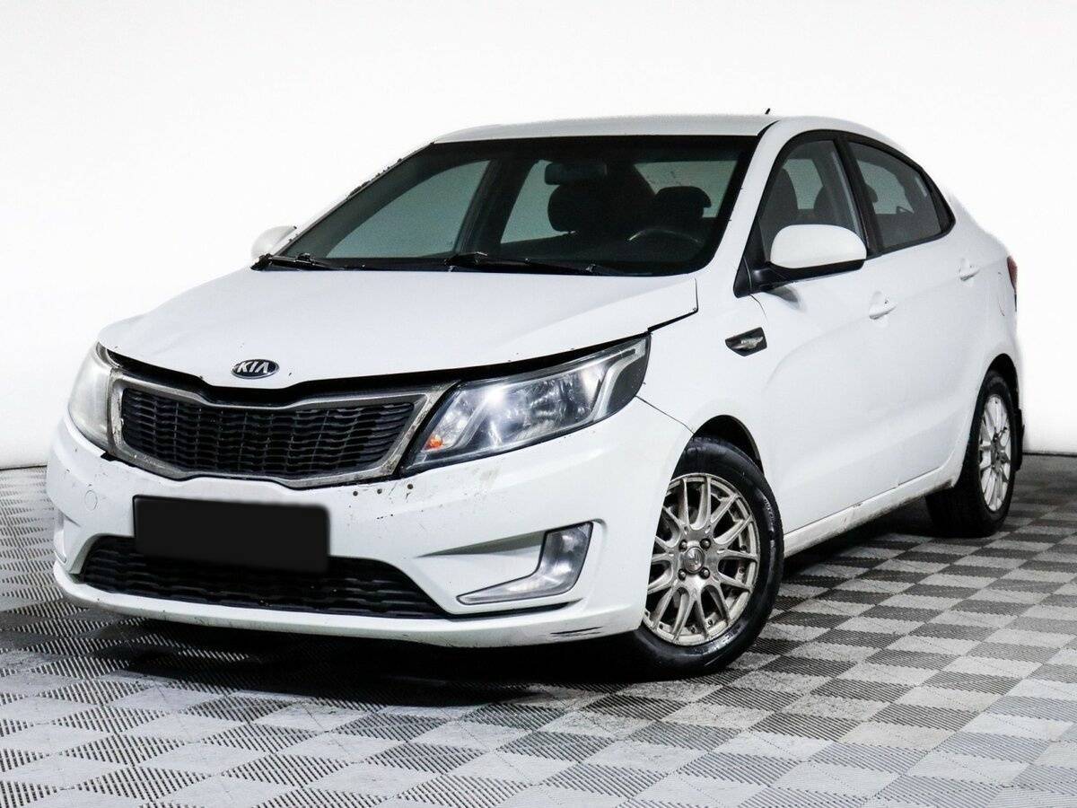 Kia Rio с пробегом — 2013 год. Фото: #0