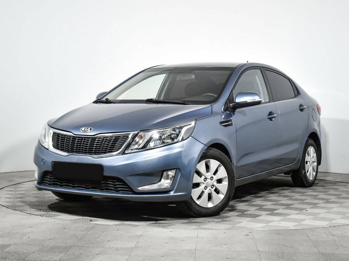 Kia Rio с пробегом — 2013 год. Фото: #0