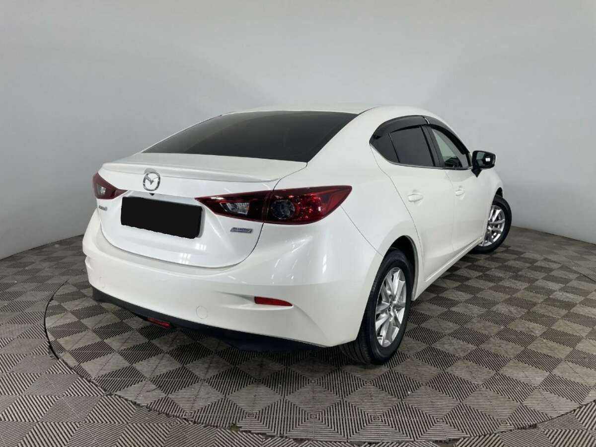 Mazda 3 с пробегом — 2014 год. Фото: #4