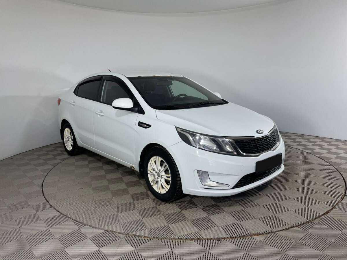 Kia Rio с пробегом — 2013 год. Фото: #2