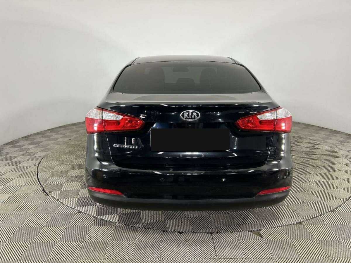 Kia Cerato с пробегом — 2014 год. Фото: #2
