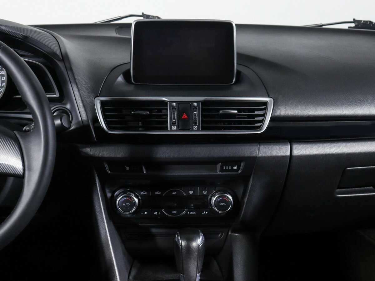 Mazda 3 с пробегом — 2014 год. Фото: #12