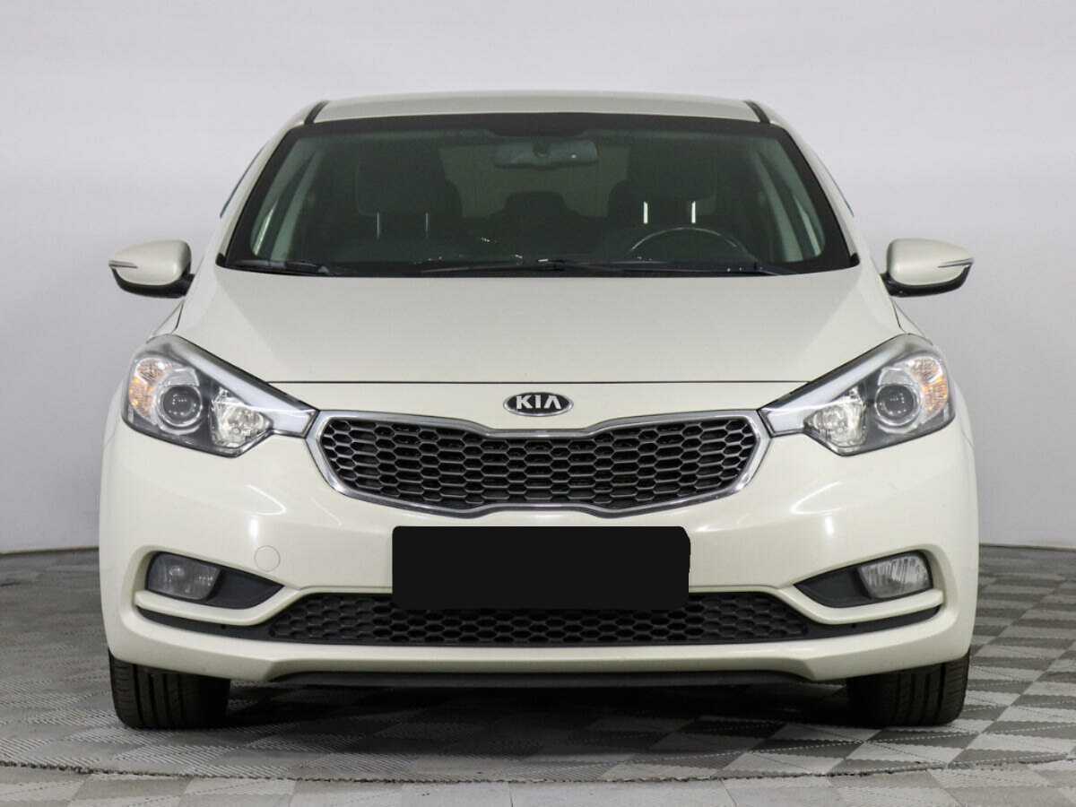 Kia Cerato с пробегом — 2013 год. Фото: #1