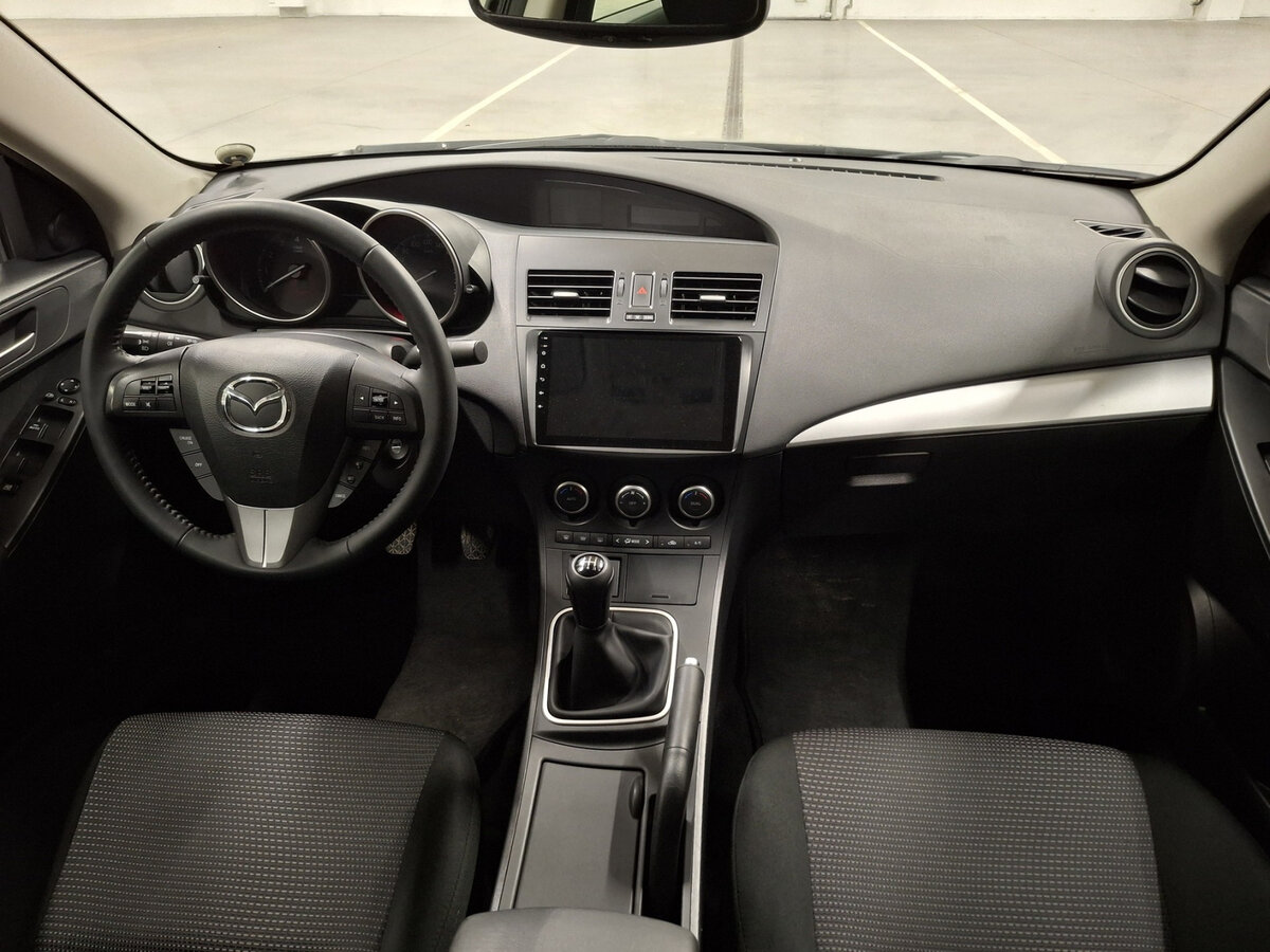 Mazda 3 с пробегом — 2013 год. Фото: #13