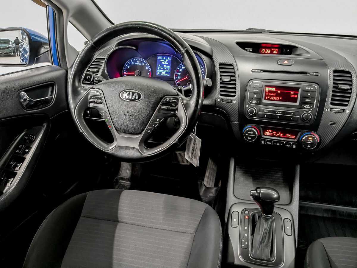 Kia Cerato с пробегом — 2013 год. Фото: #24