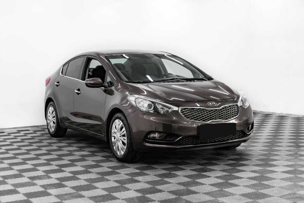Kia Cerato с пробегом — 2013 год. Фото: #2