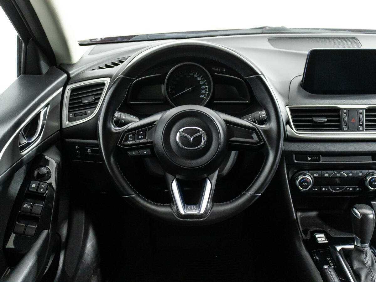 Mazda 3 с пробегом — 2016 год. Фото: #13