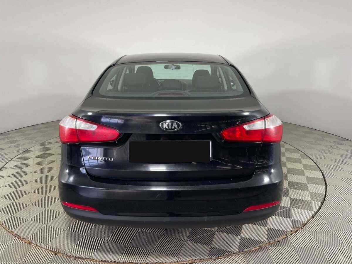 Kia Cerato с пробегом — 2015 год. Фото: #4