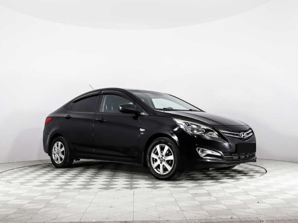 Hyundai Solaris с пробегом — 2014 год. Фото: #2