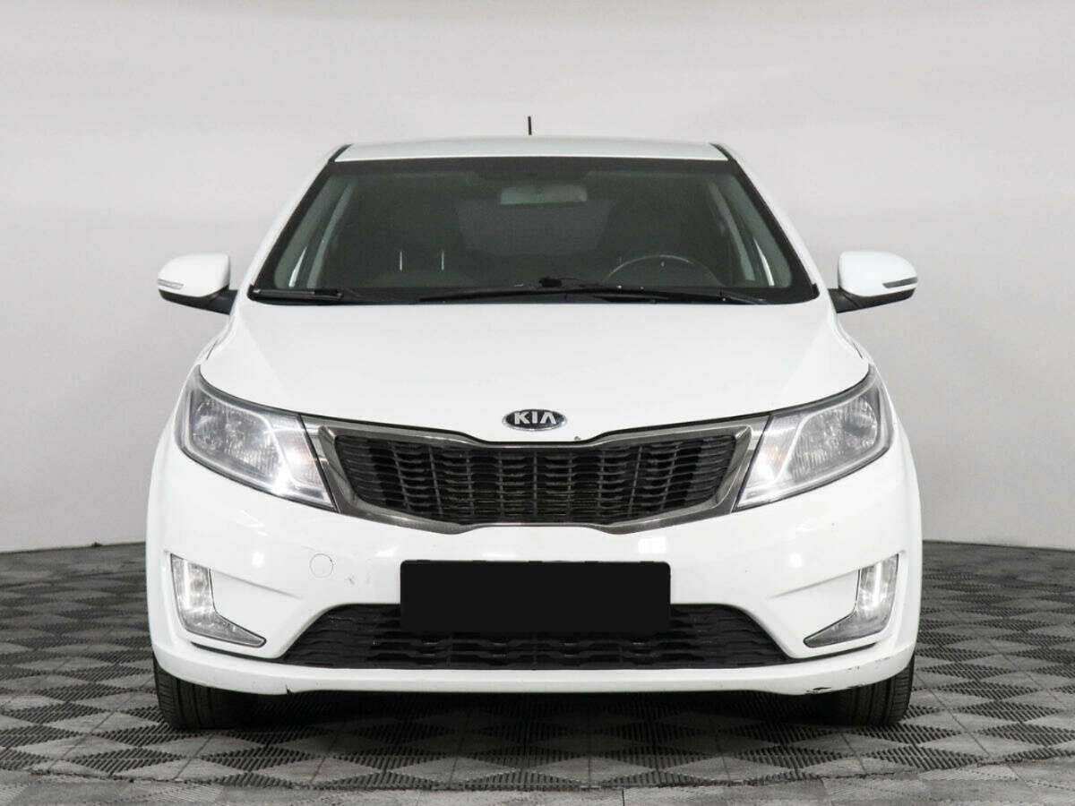 Kia Rio с пробегом — 2014 год. Фото: #1
