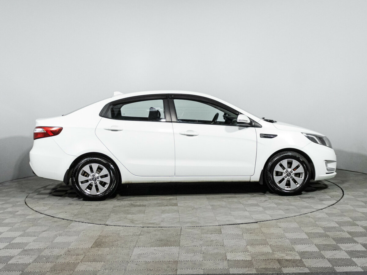 Kia Rio с пробегом — 2013 год. Фото: #3