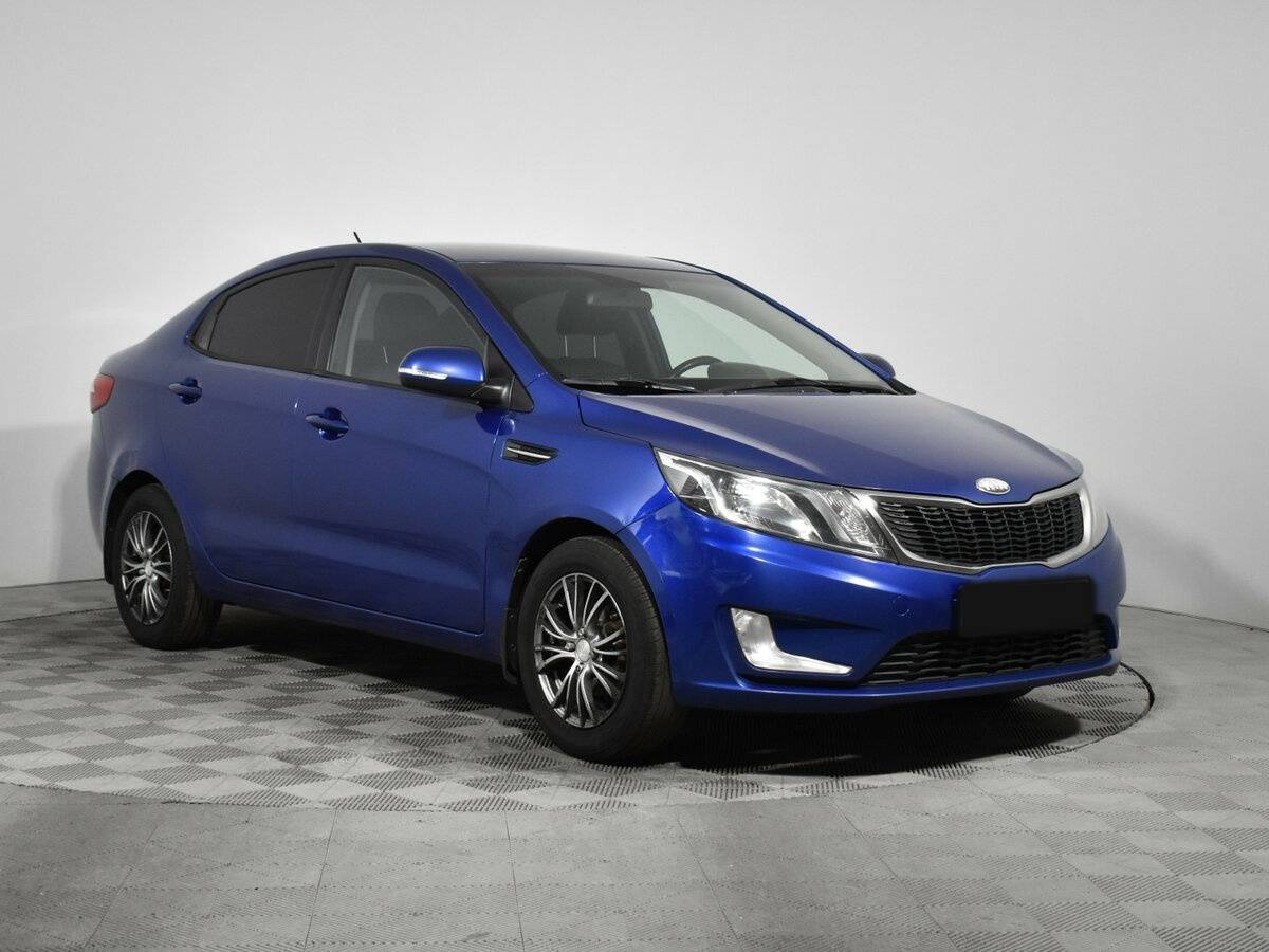 Kia Rio с пробегом — 2013 год. Фото: #2