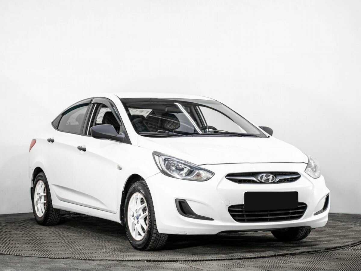 Hyundai Solaris с пробегом — 2013 год. Фото: #2