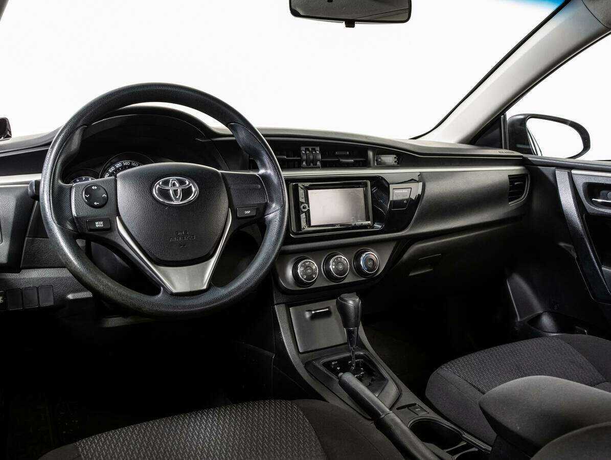 Toyota Corolla с пробегом — 2014 год. Фото: #8