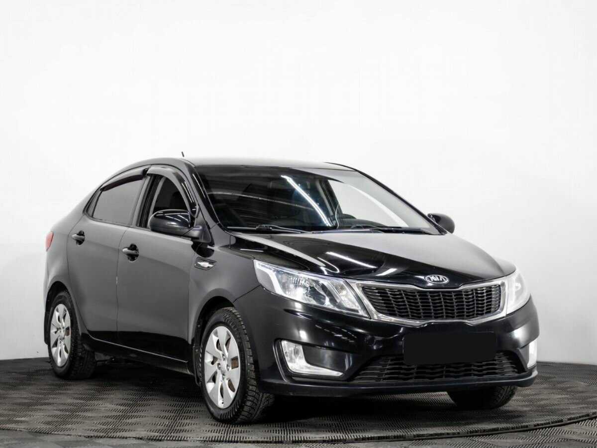 Kia Rio с пробегом — 2013 год. Фото: #2
