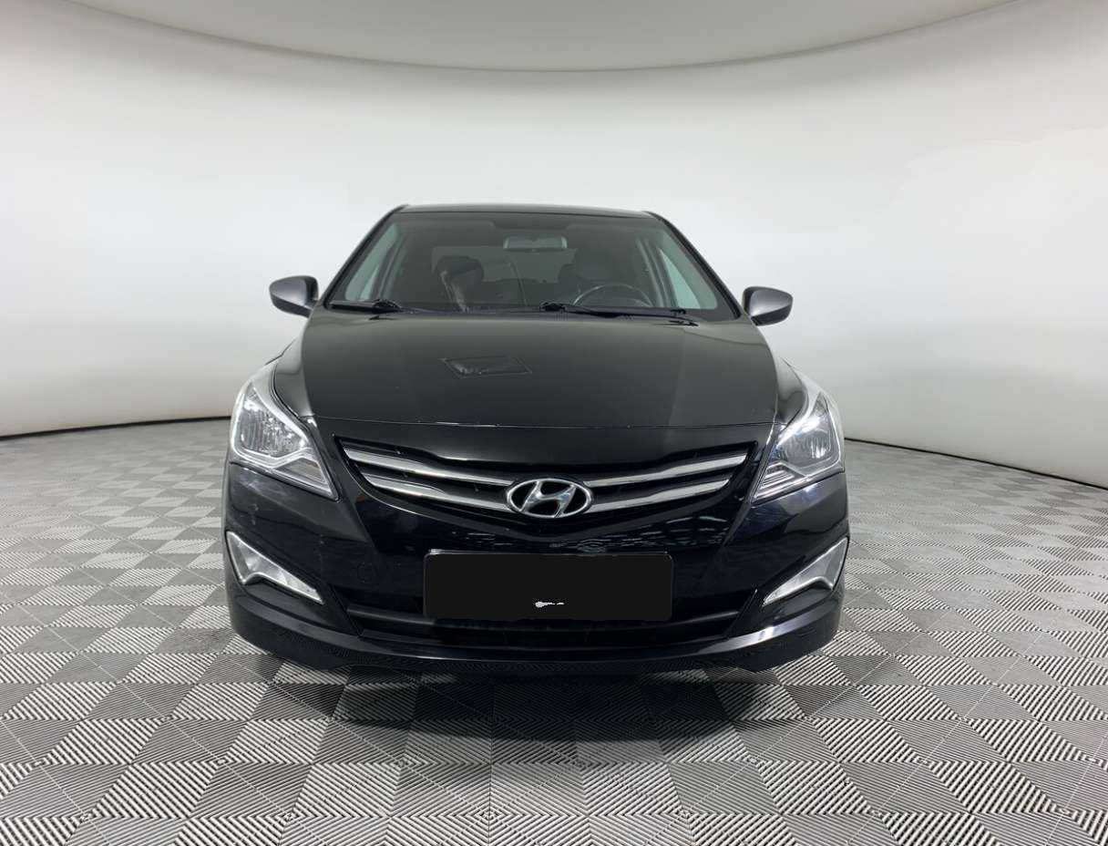 Hyundai Solaris с пробегом — 2014 год. Фото: #1