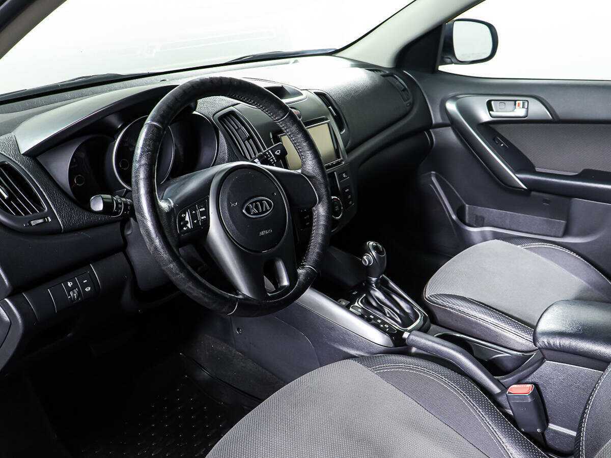 Kia Cerato с пробегом — 2012 год. Фото: #14