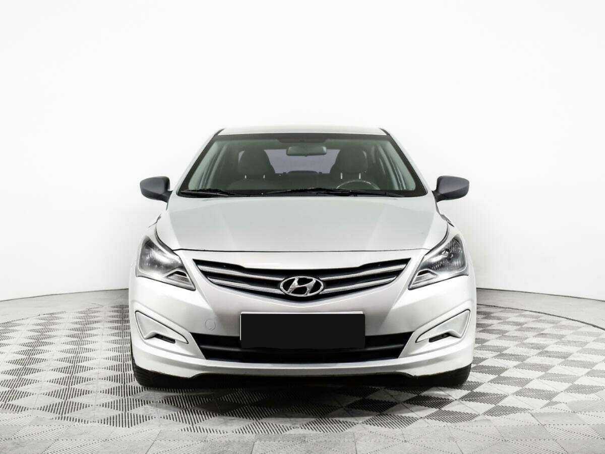 Hyundai Solaris с пробегом — 2014 год. Фото: #1