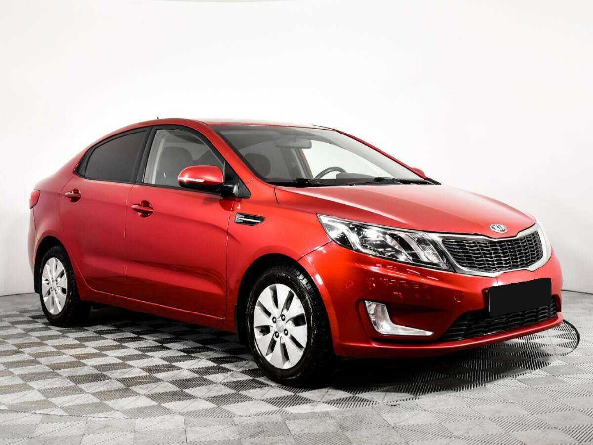 Kia Rio с пробегом — 2013 год. Фото: #2