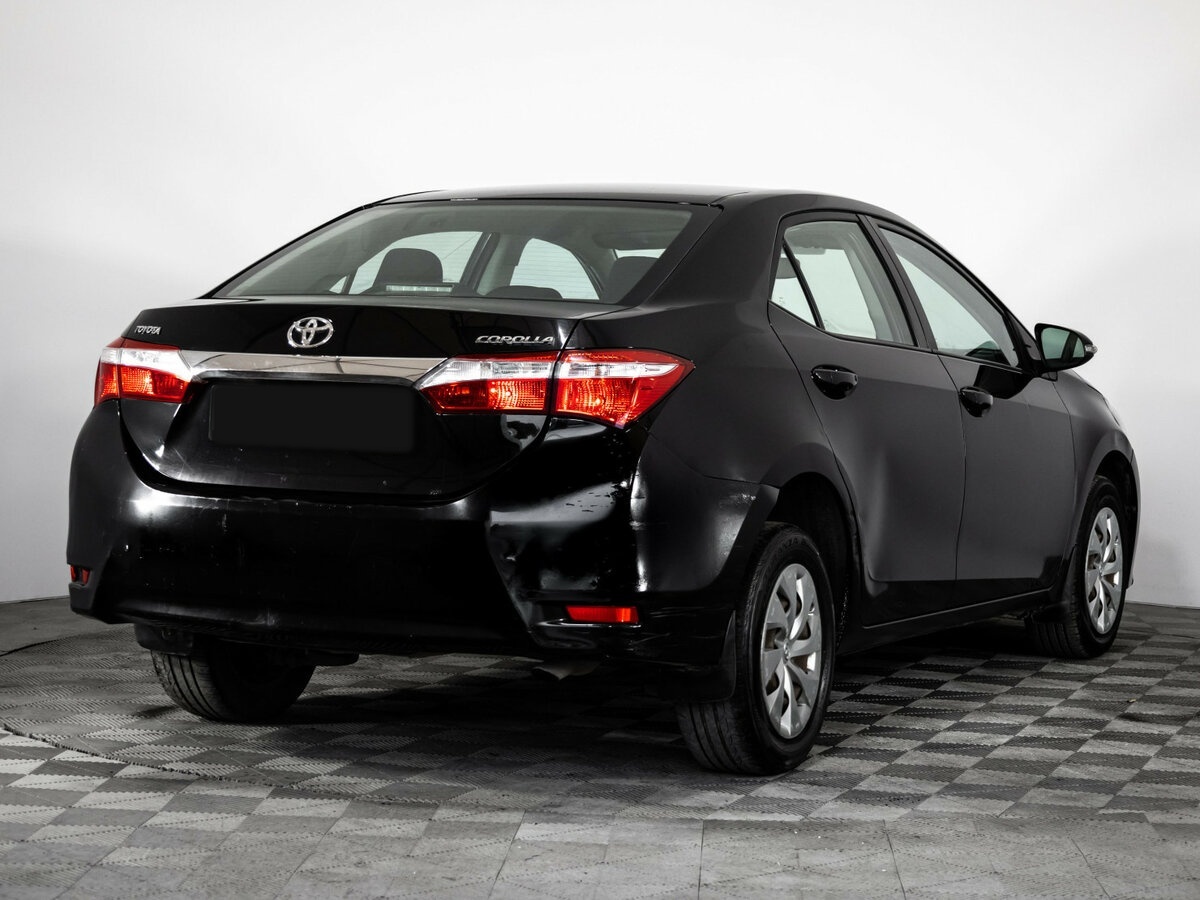 Toyota Corolla с пробегом — 2014 год. Фото: #2