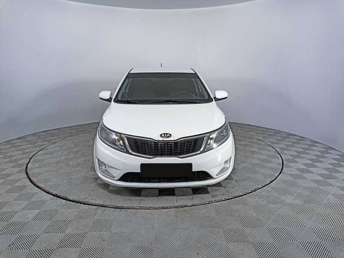 Kia Rio с пробегом — 2014 год. Фото: #1