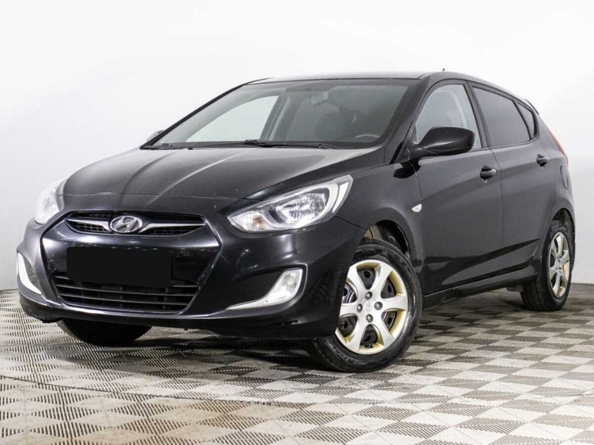 Hyundai Solaris с пробегом — 2012 год. Фото: #0