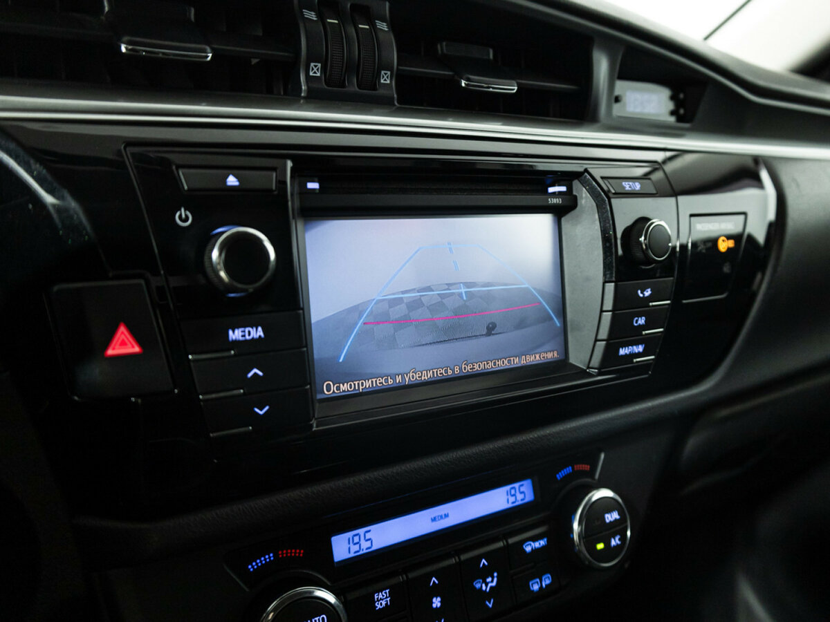 Toyota Corolla с пробегом — 2014 год. Фото: #13