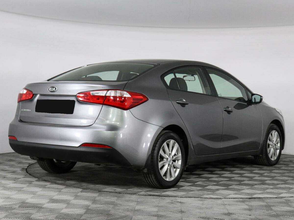 Kia Cerato с пробегом — 2014 год. Фото: #4