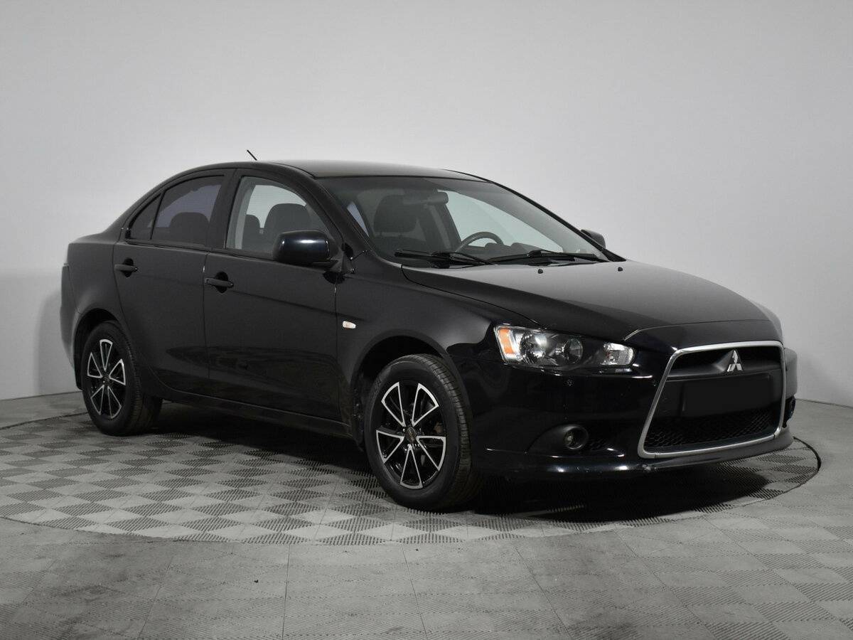 Mitsubishi Lancer с пробегом — 2012 год. Фото: #2