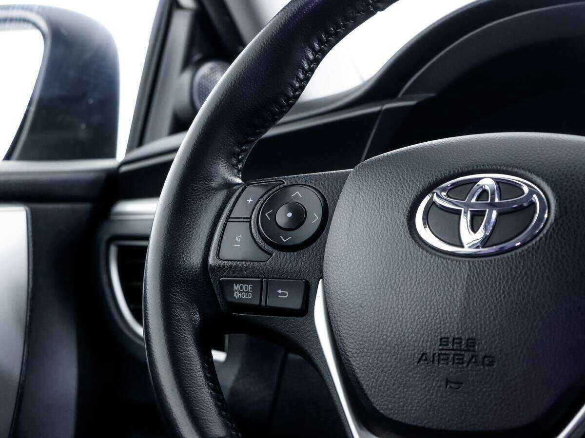 Toyota Corolla с пробегом — 2014 год. Фото: #12
