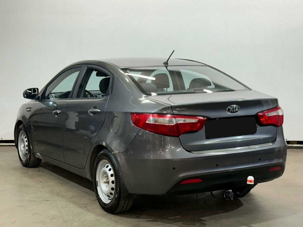 Kia Rio с пробегом — 2013 год. Фото: #6