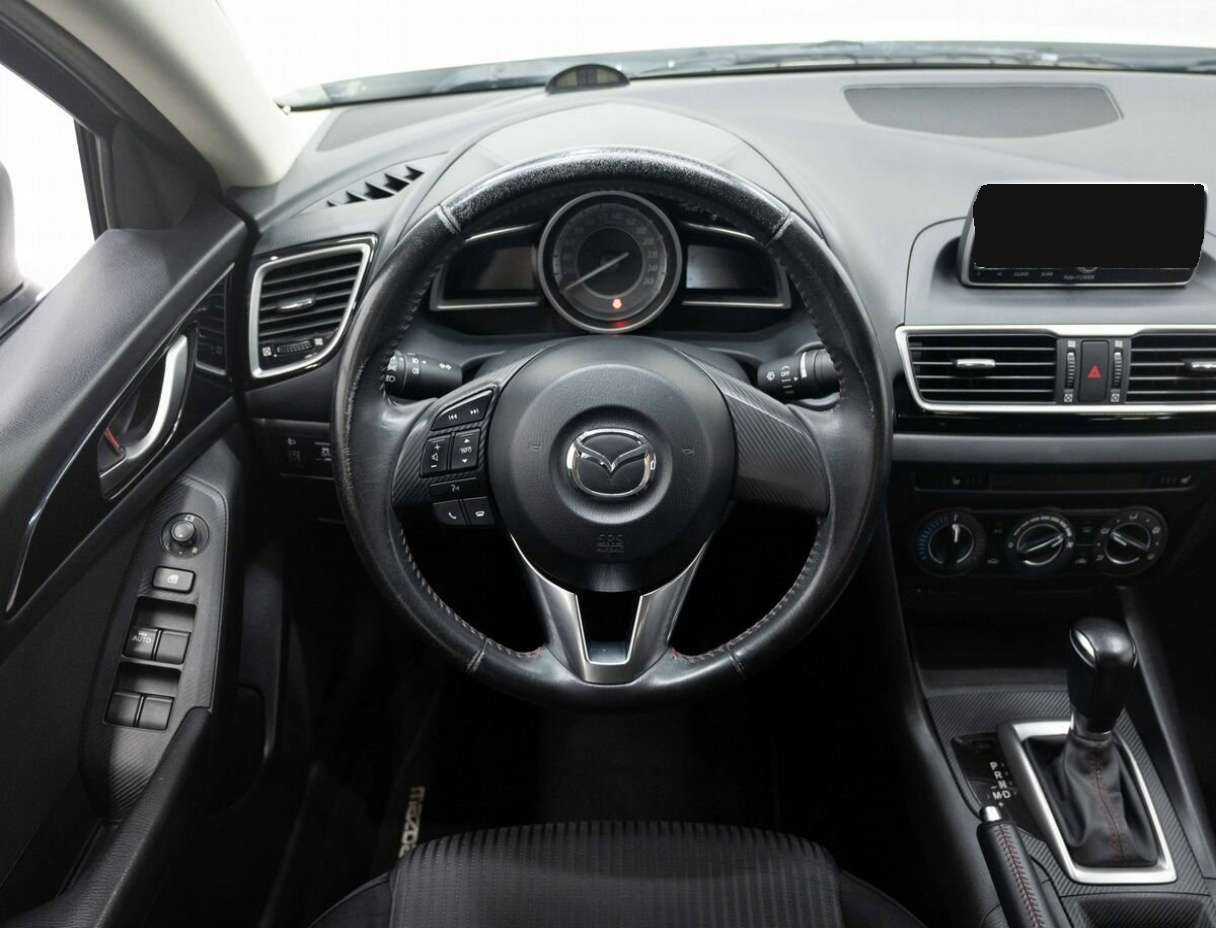 Mazda 3 с пробегом — 2013 год. Фото: #13