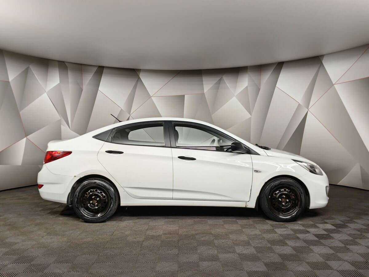 Hyundai Solaris с пробегом — 2013 год. Фото: #5