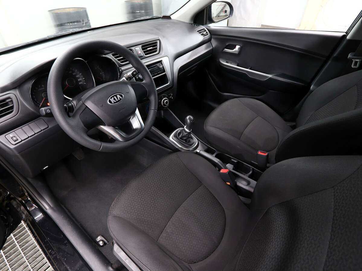 Kia Rio с пробегом — 2013 год. Фото: #6