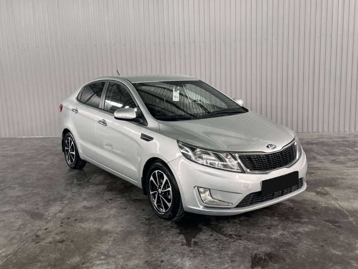 Kia Rio с пробегом — 2014 год. Фото: #2